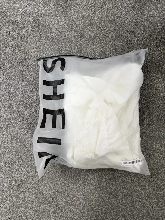 White Ruffle Trim Jumpsuit - Picture 9 of 9